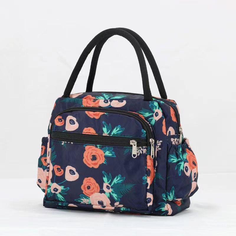 Водонепроницаемая женская сумка-тоут для ланча из ткани Оксфорд
Водонепроницаемая женская сумка-тоут для ланча из ткани Оксфорд