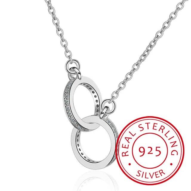 Ожерелья и подвески из стерлингового серебра 925 пробы с двойным кругом и цирконием для женщин, подарочные колье-колье, ошейники bijoux S-N61
Ожерелья и подвески из стерлингового серебра 925 пробы с двойным кругом и цирконием для женщин, подарочные колье-колье, ошейники bijoux S-N61