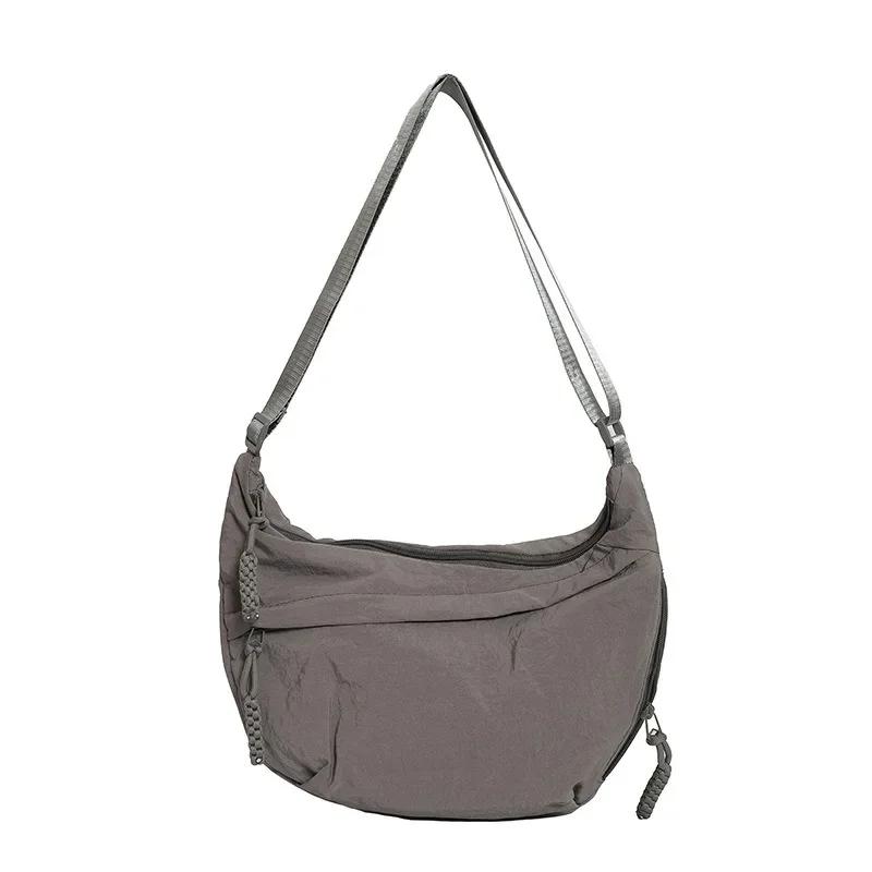 Single Shoulder Bag Women s Solid Color Trendy Personality Daily Simple Dumpling Bag Versatile Nylon Crossbody Bag сірий колір
Single Shoulder Bag Women s Solid Color Trendy Personality Daily Simple Dumpling Bag Versatile Nylon Crossbody Bag сірий колір