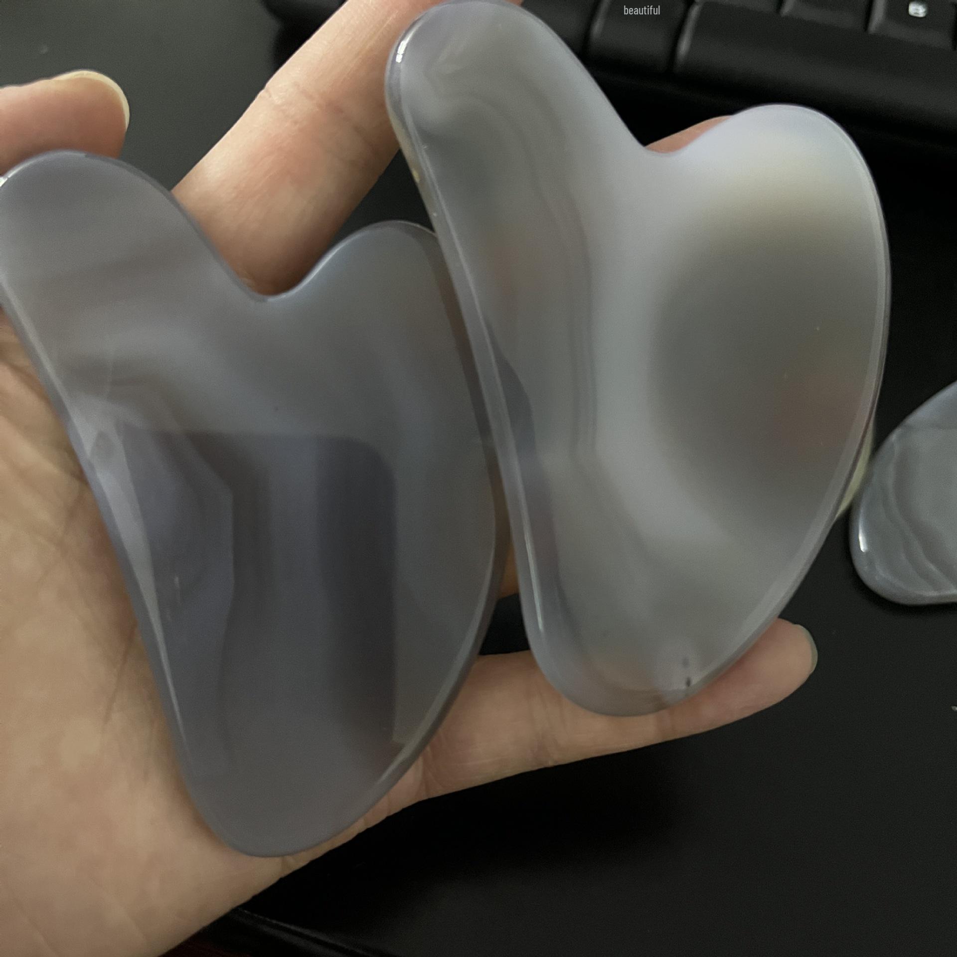 Heart-Shaped Brazilian Agate Gua Sha Board - Red, White, Gray Jade Stones for Facial Beauty
Heart-Shaped Brazilian Agate Gua Sha Board - Red, White, Gray Jade Stones for Facial Beauty
