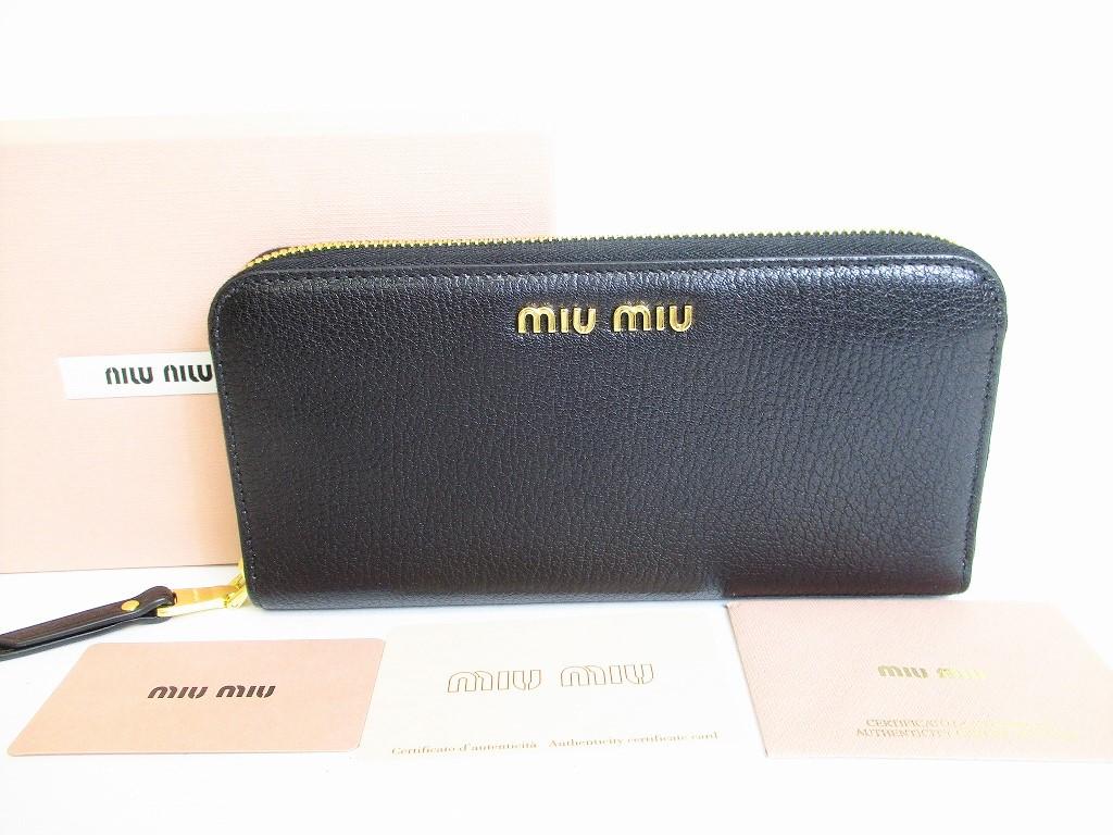 Автентичний довгий гаманець MIU MIU з чорної шкіри MADRAS на круглій блискавці №8650 відремонтований
Автентичний довгий гаманець MIU MIU з чорної шкіри MADRAS на круглій блискавці №8650 відремонтований