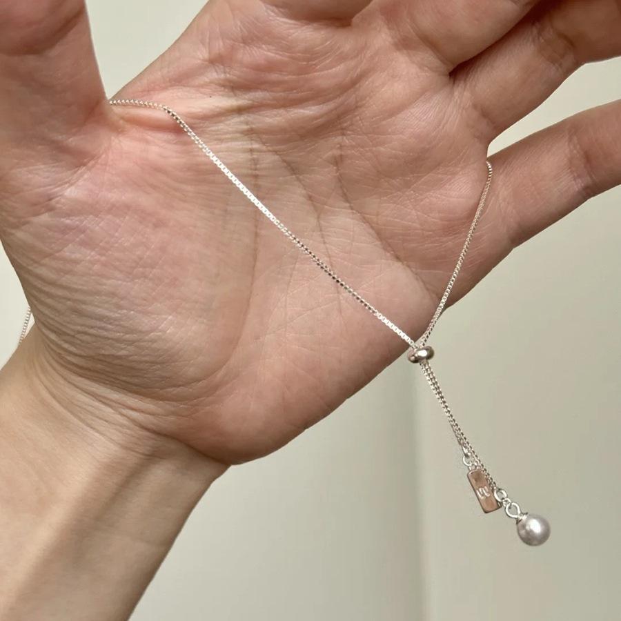 Tassel tag, pearl necklace, female simple neck chain, pull adjustable collarbone chain
Tassel tag, pearl necklace, female simple neck chain, pull adjustable collarbone chain
