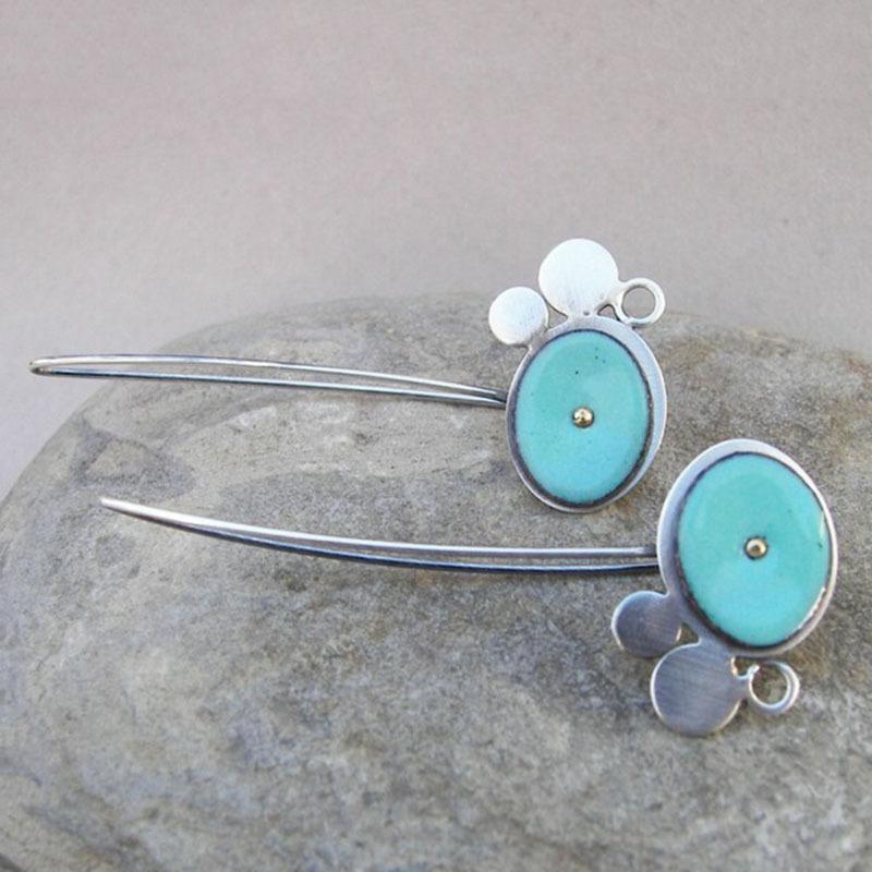 Handcrafted Asymmetrical Earrings with Oval Stone Accent and Mixed Metal Circles Long Drop Design for Women One Size
Handcrafted Asymmetrical Earrings with Oval Stone Accent and Mixed Metal Circles Long Drop Design for Women One Size