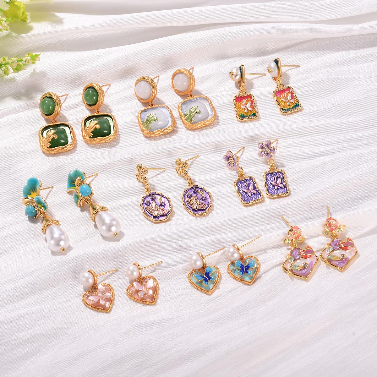 Turquoise Pearl Butterfly Earrings: Gradient Oil Painting Series with Tassel Detail for Women
Turquoise Pearl Butterfly Earrings: Gradient Oil Painting Series with Tassel Detail for Women