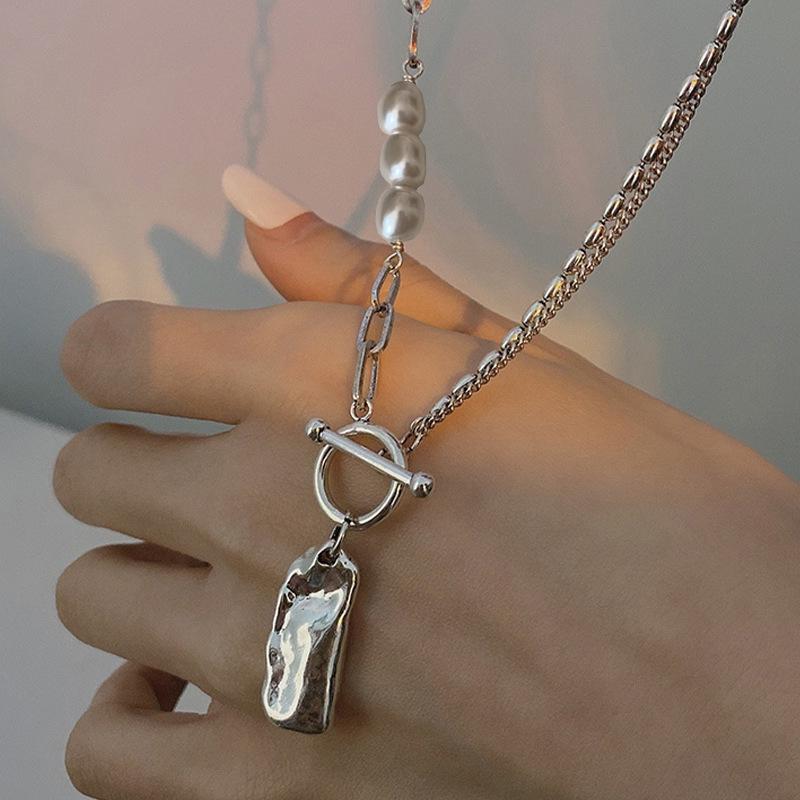 Korean-Style Asymmetrical Pearl Necklace with Retro OT Buckle - Multi-Layer Clavicle Chain for Women
Korean-Style Asymmetrical Pearl Necklace with Retro OT Buckle - Multi-Layer Clavicle Chain for Women
