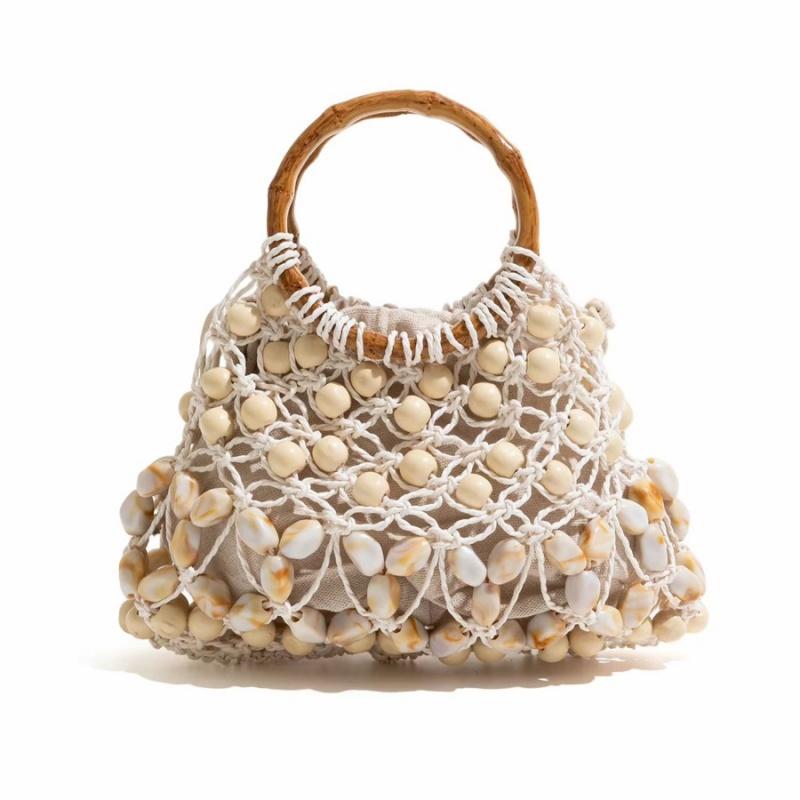 2026 New Bead Handmade Woven Bag Women s Hollowed Out Shell Decoration Bamboo Section Handbag Summer Grass Woven Beach Bag
2026 New Bead Handmade Woven Bag Women s Hollowed Out Shell Decoration Bamboo Section Handbag Summer Grass Woven Beach Bag