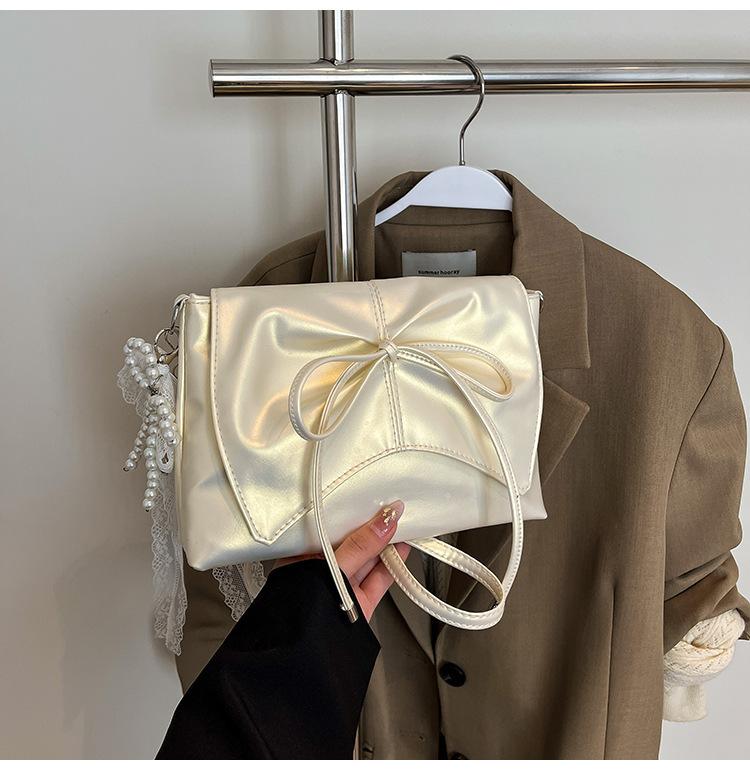 Сумка в балетном стиле 2025 женская перламутровая с бантом на плечо, сумка кроссбоди, сумка-конверт, универсальная сумка для девушки, новые плиссировки Without pendant
Сумка в балетном стиле 2025 женская перламутровая с бантом на плечо, сумка кроссбоди, сумка-конверт, универсальная сумка для девушки, новые плиссировки Without pendant