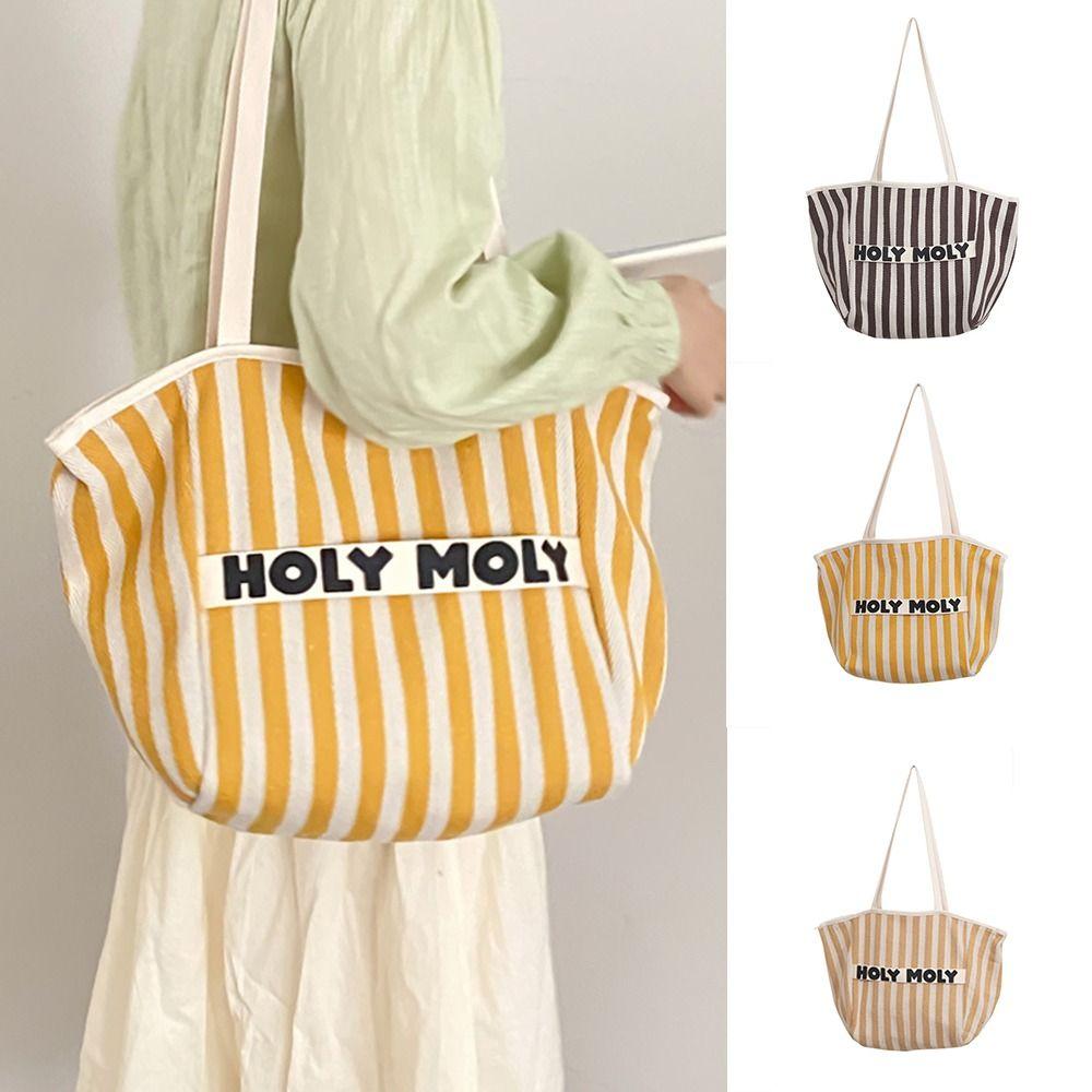 Large Capacity Vacation Tote Bag Solid Color Shoulder Bag Casual Retro Strip Canvas Bag Student
Large Capacity Vacation Tote Bag Solid Color Shoulder Bag Casual Retro Strip Canvas Bag Student