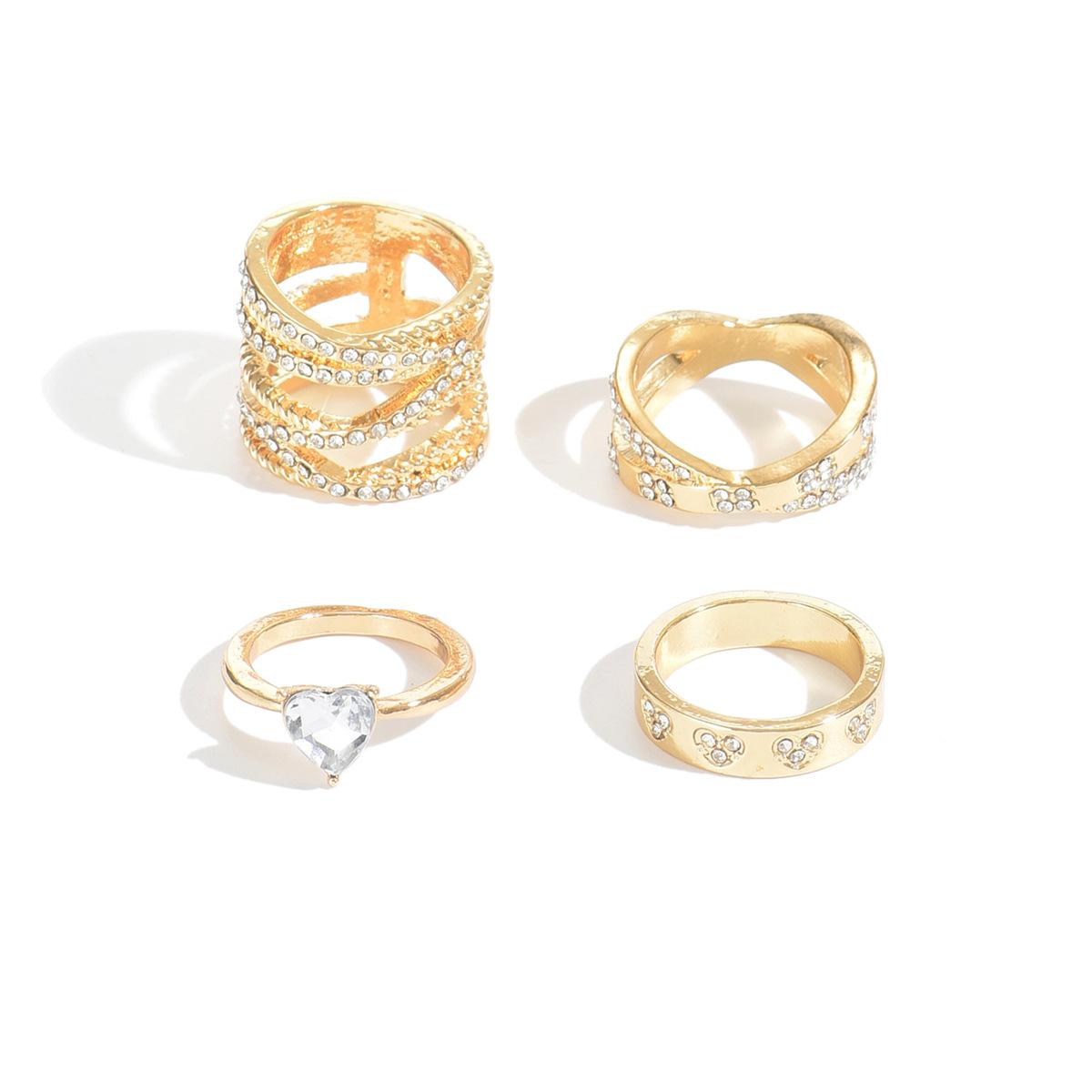 European and American simple temperament, love diamond-set ring, female design sense winding, stacking and wearing alloy ring set
European and American simple temperament, love diamond-set ring, female design sense winding, stacking and wearing alloy ring set
