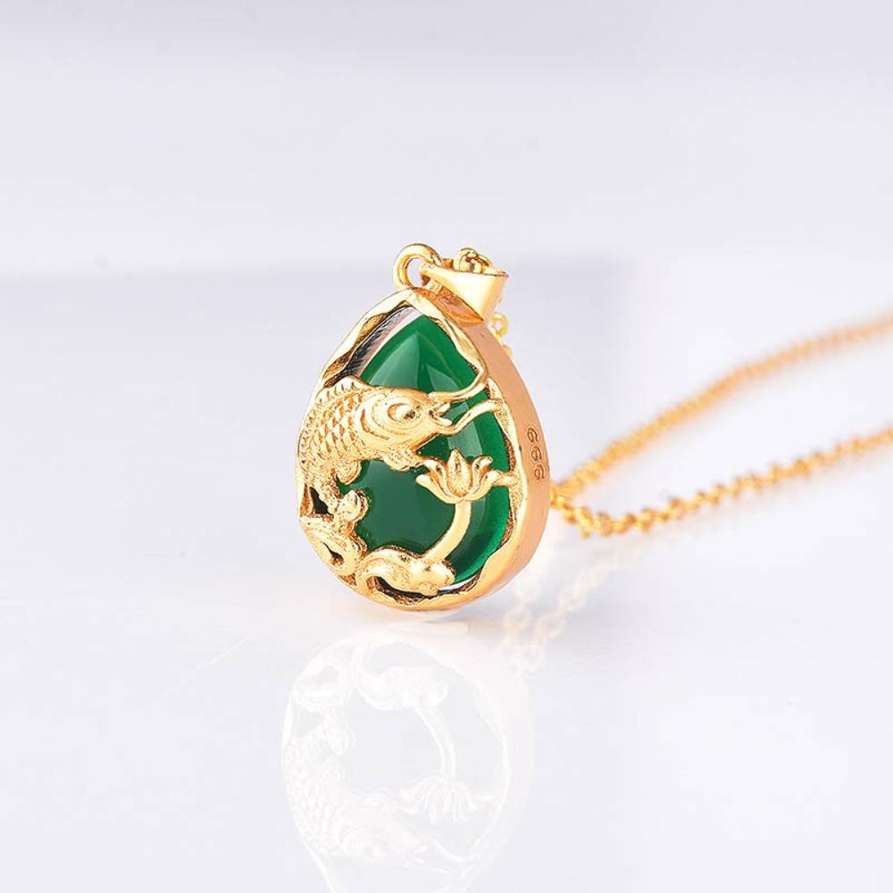 Gold Plated Lotus Necklace with Hetian Jade Fish Pendant Traditional Craftsmanship Bird Flower Design
Gold Plated Lotus Necklace with Hetian Jade Fish Pendant Traditional Craftsmanship Bird Flower Design