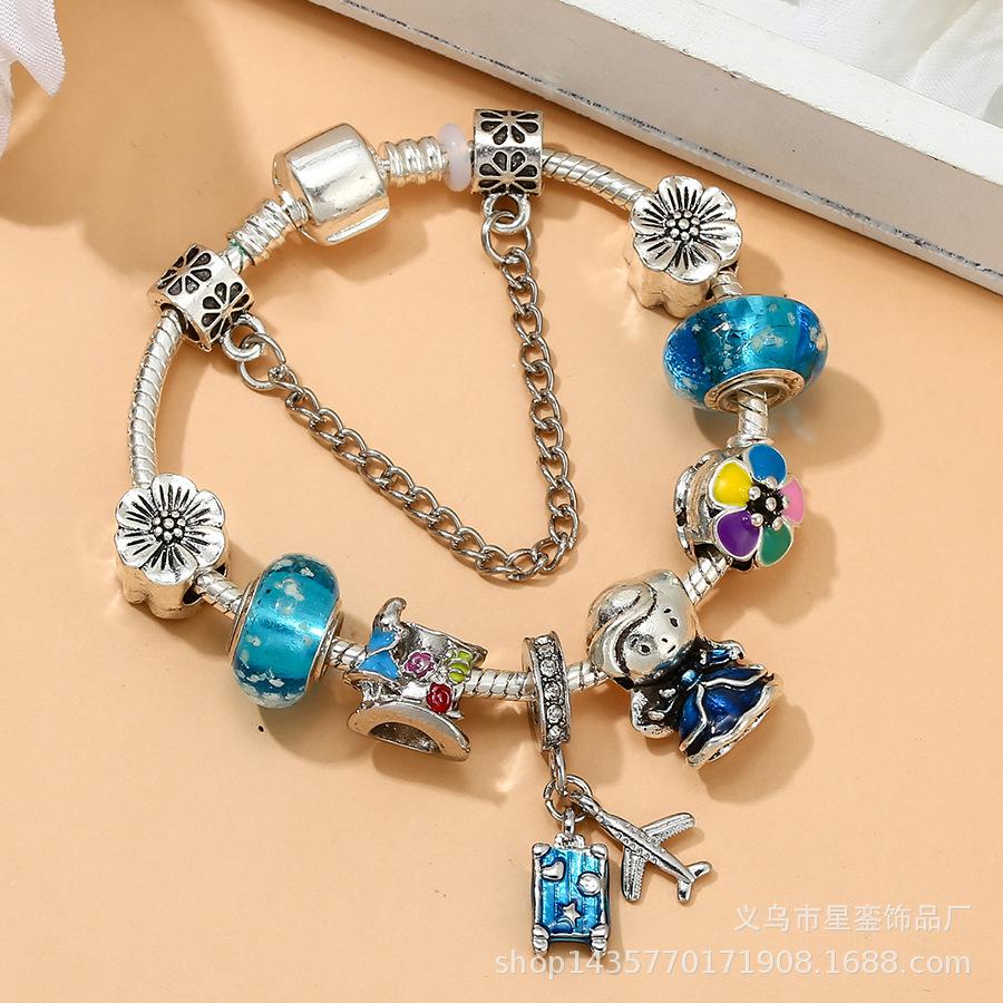 Blue Suitcase Charm Bracelet with Airplane, Flower, Tea Party Beads for Women & Girls 19 cm
Blue Suitcase Charm Bracelet with Airplane, Flower, Tea Party Beads for Women & Girls 19 cm