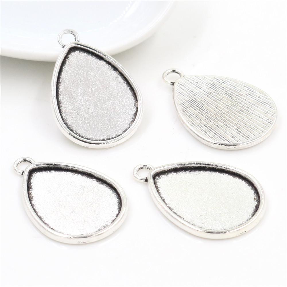 10pcs 18x25mm Inner Size Antique Bronze Silver Plated Drop Style Cameo Cabochon Base Setting Charms Pendant necklace findings
10pcs 18x25mm Inner Size Antique Bronze Silver Plated Drop Style Cameo Cabochon Base Setting Charms Pendant necklace findings