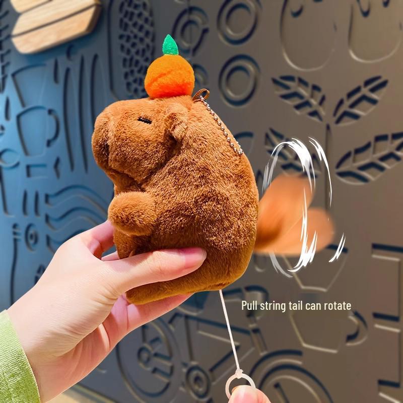 Creative Cartoon Capybara Wagging Tail Keychain Pendant - Plush Persimmon Design for Couples or Gifts
Creative Cartoon Capybara Wagging Tail Keychain Pendant - Plush Persimmon Design for Couples or Gifts
