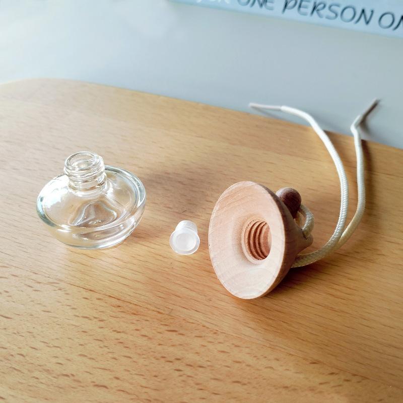 2Pcs Empty Glass Essential Oil Vial With Wooden Cap Car Hanging Perfume Diffuser Bottle For Auto Rearview Mirror Decoration one size
2Pcs Empty Glass Essential Oil Vial With Wooden Cap Car Hanging Perfume Diffuser Bottle For Auto Rearview Mirror Decoration one size