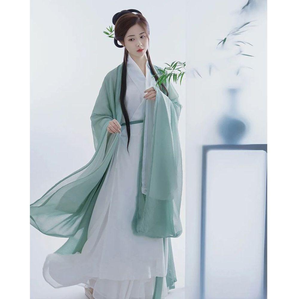 Китайский женский костюм в стиле династий Вэй и Цзинь, ханьфу, женский костюм с широкими рукавами, перекрестным воротником и юбкой
Китайский женский костюм в стиле династий Вэй и Цзинь, ханьфу, женский костюм с широкими рукавами, перекрестным воротником и юбкой