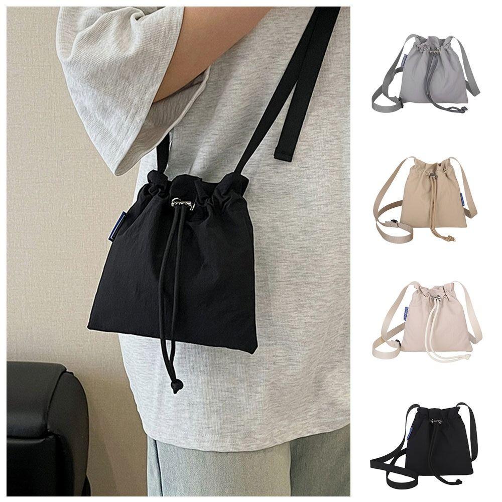 Crossbody Bag Drawstring Bucket Bag Quick-dry Mobile Phone Bag Casual Nylon Shoulder Bag Travel хакі
Crossbody Bag Drawstring Bucket Bag Quick-dry Mobile Phone Bag Casual Nylon Shoulder Bag Travel хакі