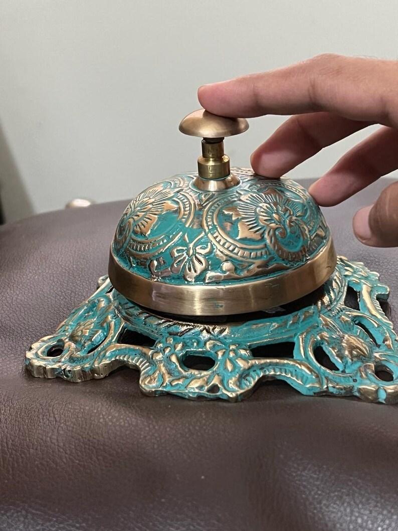 Brass Desk Bell - Classic Shop Counter Bell - Front Desk Retail Service Bell- Antique Reception Bell -Old-fashioned Store Accessory коричневий
Brass Desk Bell - Classic Shop Counter Bell - Front Desk Retail Service Bell- Antique Reception Bell -Old-fashioned Store Accessory коричневий