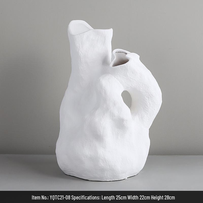 Белая большая нестандартная керамическая ваза для декора и выставки
Белая большая нестандартная керамическая ваза для декора и выставки