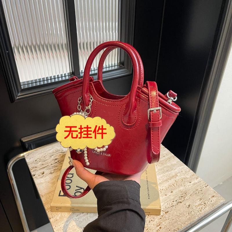 Lightweight red vegetable basket bucket bag women s new light luxury niche high-end messenger bag червоний
Lightweight red vegetable basket bucket bag women s new light luxury niche high-end messenger bag червоний