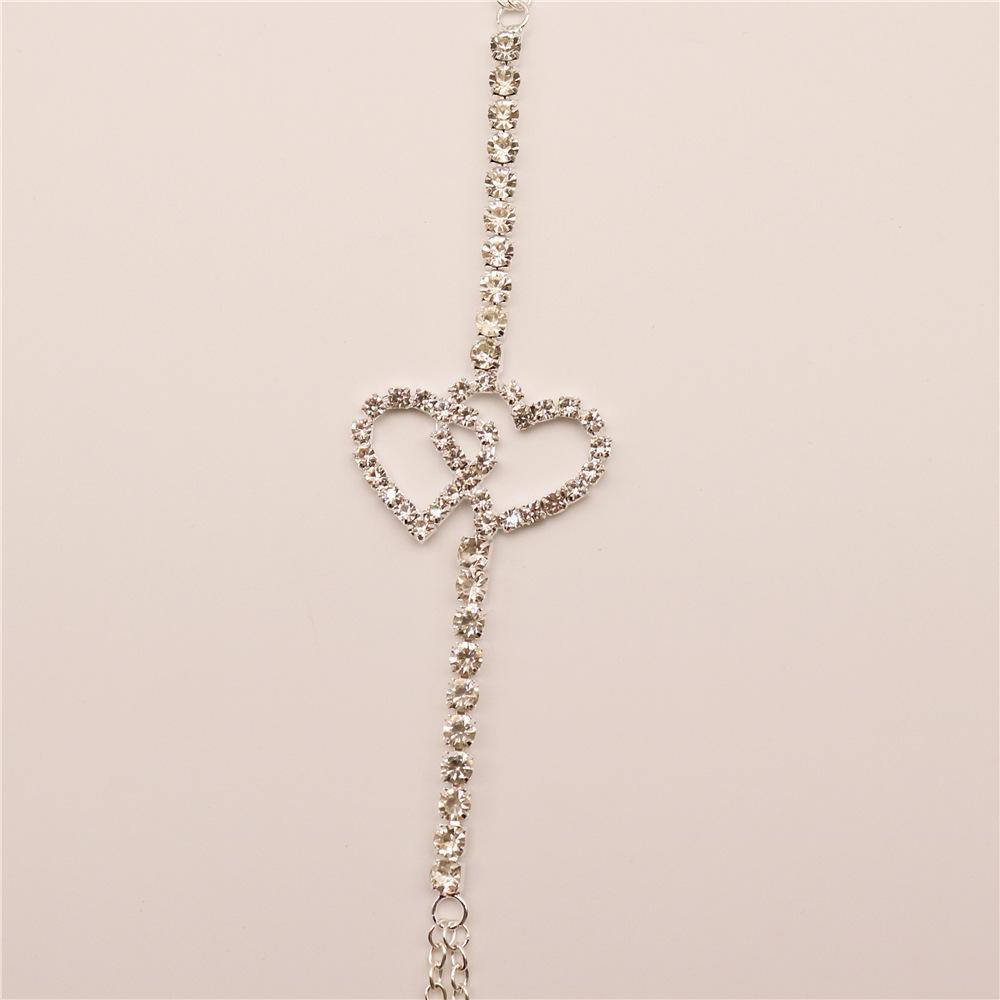 European And American New Simple Double Heart Chest Chain Nightclub Shiny Sexy Rhinestone Body Chain Female Body Chain
European And American New Simple Double Heart Chest Chain Nightclub Shiny Sexy Rhinestone Body Chain Female Body Chain