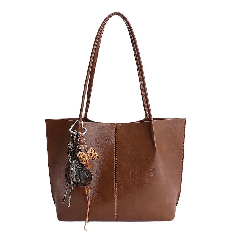Simple retro largecapacity bag women s new fashion commuter shoulder bag highend portable tote bag No pendant model коричневый
Simple retro largecapacity bag women s new fashion commuter shoulder bag highend portable tote bag No pendant model коричневый
