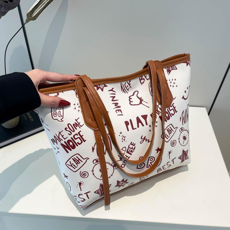 Large capacity tote bag female cute fresh cartoon print simple niche autumn new commuting class shoulder bag коричневий
Large capacity tote bag female cute fresh cartoon print simple niche autumn new commuting class shoulder bag коричневий