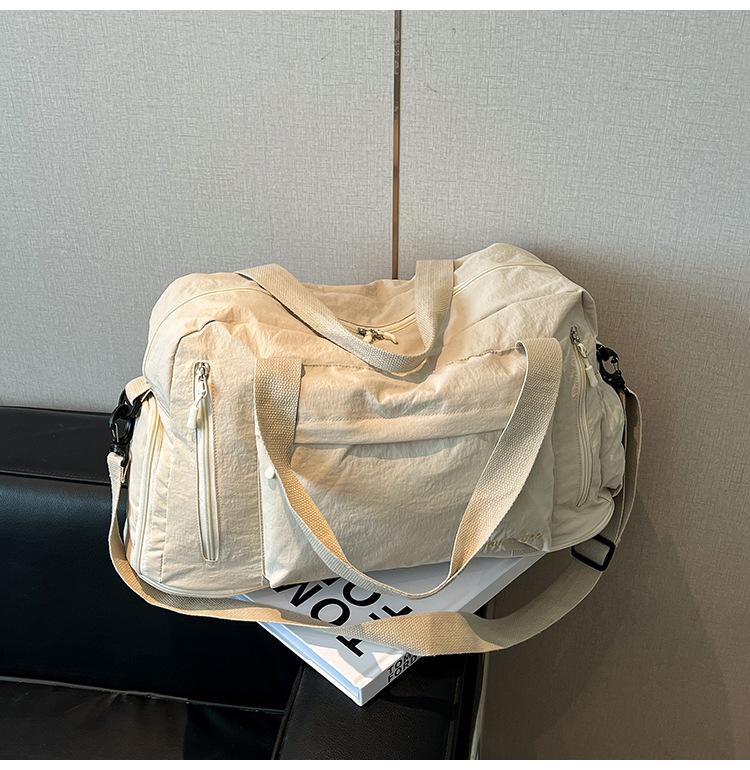 Повседневная сумка большой вместимости, женская новая сумка для деловых поездок, повседневная и легкая сумка для фитнеса и йоги, портативная сумка-мессенджер, тренд белый
Повседневная сумка большой вместимости, женская новая сумка для деловых поездок, повседневная и легкая сумка для фитнеса и йоги, портативная сумка-мессенджер, тренд белый