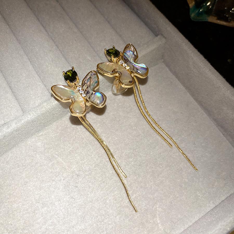 K real gold electroplated zircon sea shell butterfly fringed earclip European and American retro earrings light luxury high-end earrings women
K real gold electroplated zircon sea shell butterfly fringed earclip European and American retro earrings light luxury high-end earrings women