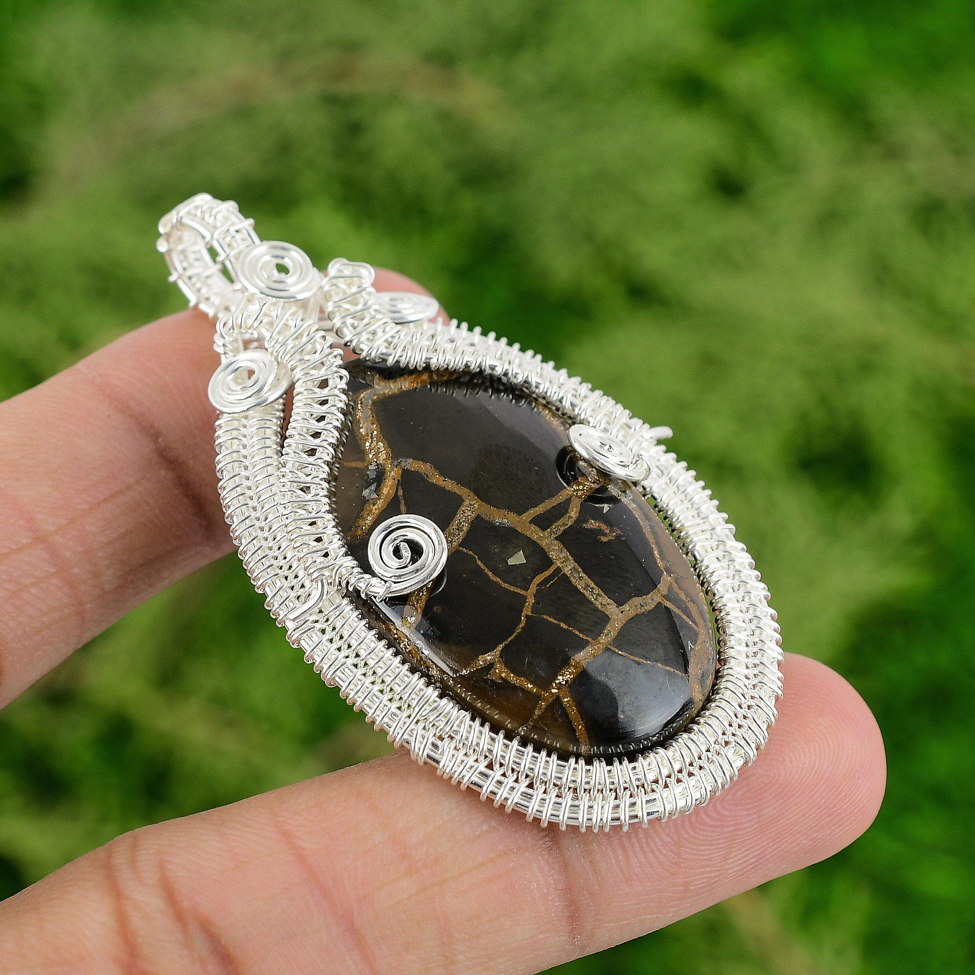 Moroccan Mud Crack Fossil Gemstone 925 Silver Trendy Wire Wrap Pendant Jewelry
Moroccan Mud Crack Fossil Gemstone 925 Silver Trendy Wire Wrap Pendant Jewelry