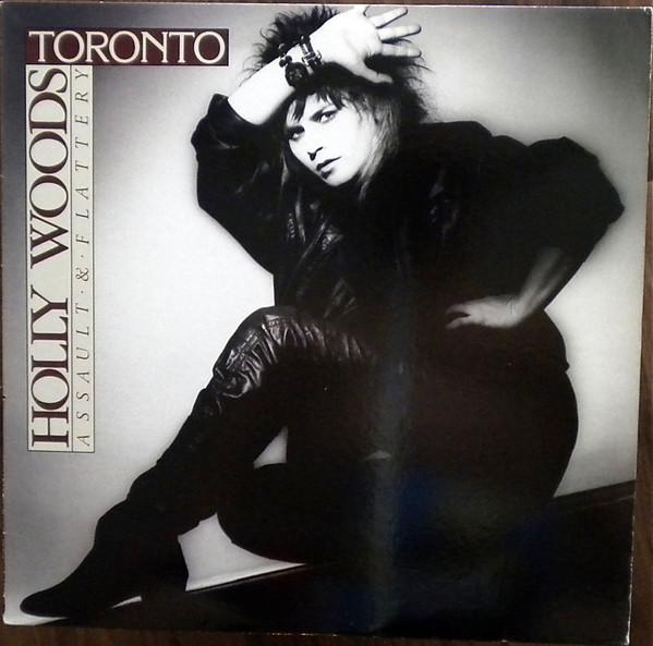 LP Record HOLLY WOODS Assault Flattery SGR1024 SOLID GOLD 1984 Canada Rock Used
LP Record HOLLY WOODS Assault Flattery SGR1024 SOLID GOLD 1984 Canada Rock Used
