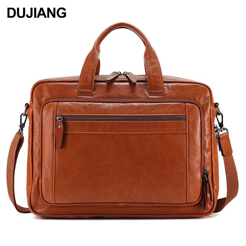 Кожаный портфель DUJIANG: Сумка большой вместимости для 15-дюймового ноутбука и деловых поездок
Кожаный портфель DUJIANG: Сумка большой вместимости для 15-дюймового ноутбука и деловых поездок