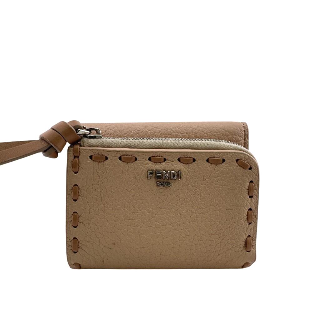 FENDI 8M0499 Topstitching Celeria leather Peekaboo Micro Tri-fold wallet pink leather Used
FENDI 8M0499 Topstitching Celeria leather Peekaboo Micro Tri-fold wallet pink leather Used
