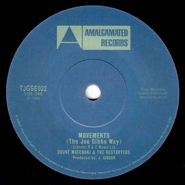 7inch Record COUNT MACHUKI / THE DESTROYERS - Movements (The Joe Gibbs Way) / Cae TJGSE022 Trojan Records, 2004 UK Reggae, Ska & Dub Used
7inch Record COUNT MACHUKI / THE DESTROYERS - Movements (The Joe Gibbs Way) / Cae TJGSE022 Trojan Records, 2004 UK Reggae, Ska & Dub Used
