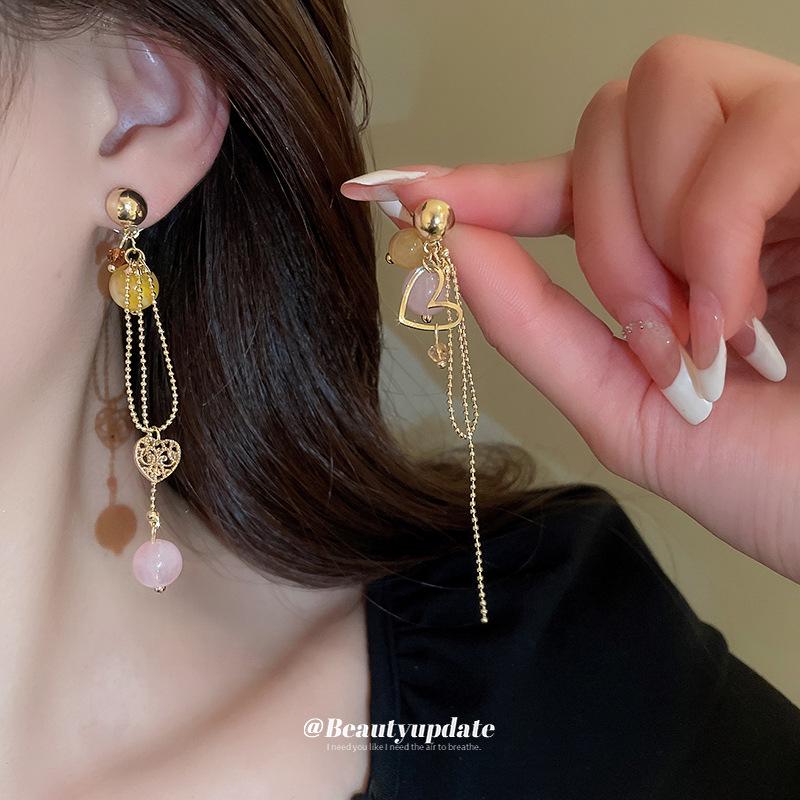 Silver Needle Crystal Tassel Earrings: French Retro Style, Fashionable Heart Design for Women
Silver Needle Crystal Tassel Earrings: French Retro Style, Fashionable Heart Design for Women