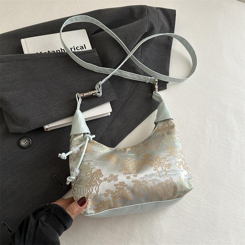 Niche embroidery bag ladies new summer shoulder messenger bag handbag dumpling bag синій
Niche embroidery bag ladies new summer shoulder messenger bag handbag dumpling bag синій