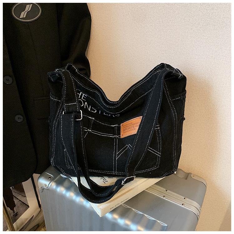 Korean version ins texture denim bag fashion casual shoulder bag commuting shopping versatile large capacity messenger bag чорний
Korean version ins texture denim bag fashion casual shoulder bag commuting shopping versatile large capacity messenger bag чорний