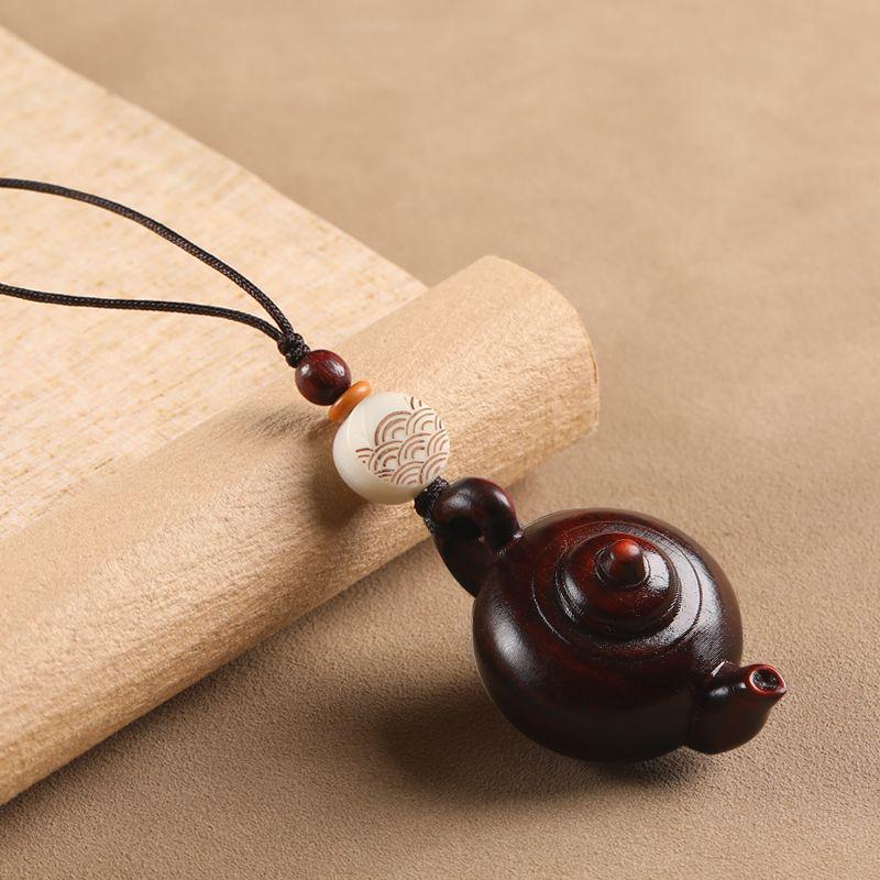 Rosewood Teapot Keychain and Phone Lanyard Pendant.
Rosewood Teapot Keychain and Phone Lanyard Pendant.