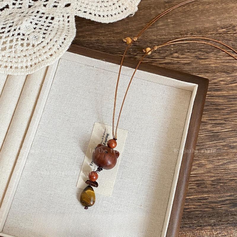 Tiger-eye Stone Wooden Little Bear Dog Necklace for Women in Autumn and Winter, Cute and Unique Design, Small Sweater Chain Accessory Water Drop Bear
Tiger-eye Stone Wooden Little Bear Dog Necklace for Women in Autumn and Winter, Cute and Unique Design, Small Sweater Chain Accessory Water Drop Bear