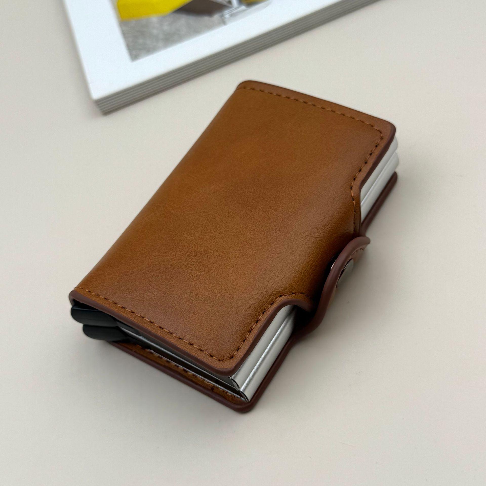Anti-Skimming RFID Aluminum Card Holder with Large Capacity and Carbon Fiber PU Design
Anti-Skimming RFID Aluminum Card Holder with Large Capacity and Carbon Fiber PU Design