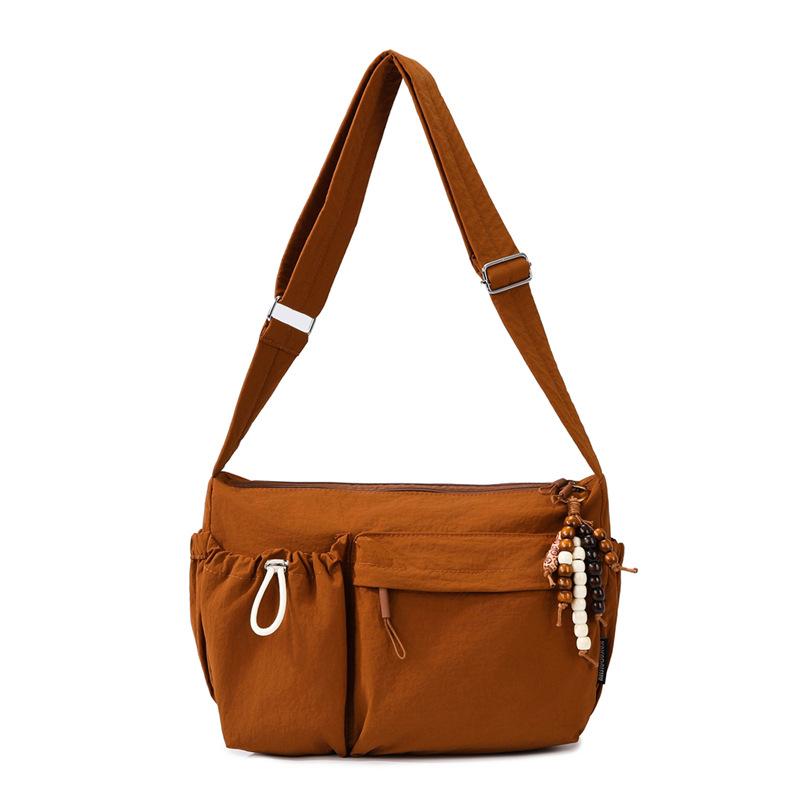 Waterproof nylon cloth sports wind dumpling bag simple casual messenger bag women s lightweight versatile commuter bag коричневый
Waterproof nylon cloth sports wind dumpling bag simple casual messenger bag women s lightweight versatile commuter bag коричневый