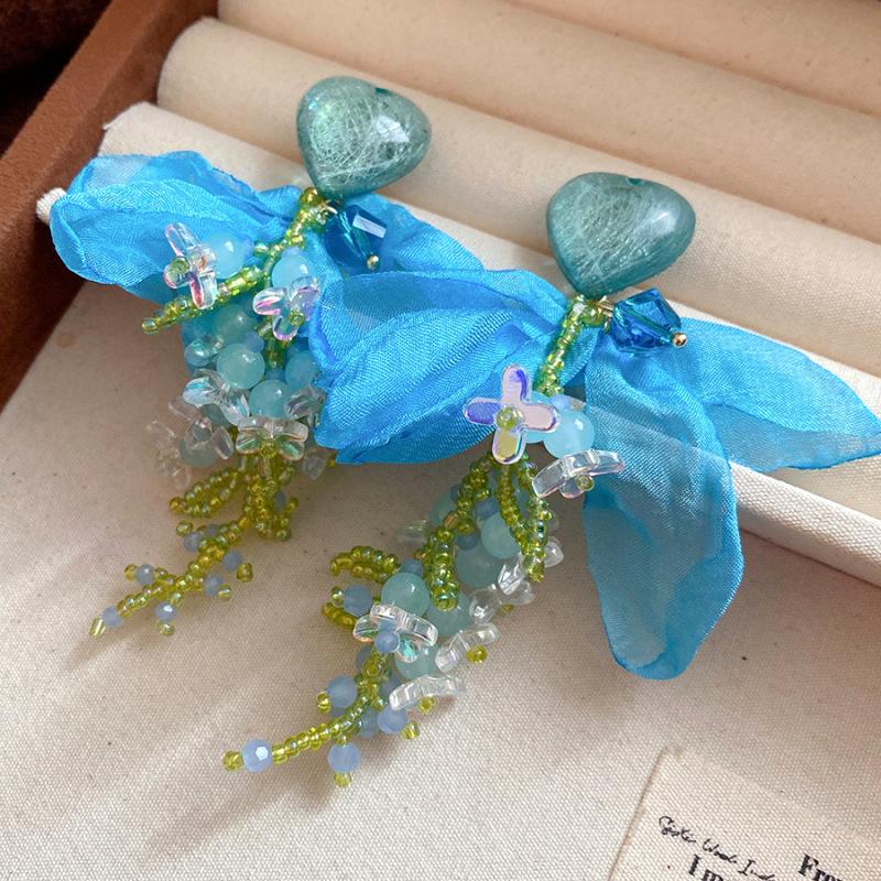 Silver needle love chiffon flower fringed earrings seaside vacation style fashion temperament earrings niche high-end earrings women
Silver needle love chiffon flower fringed earrings seaside vacation style fashion temperament earrings niche high-end earrings women