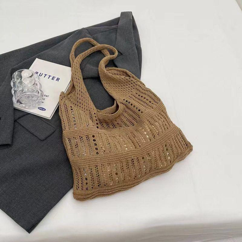 Vintage knitted seaside bag shoulder new vacation beach hollowed out casual wool woven tote large capacity
Vintage knitted seaside bag shoulder new vacation beach hollowed out casual wool woven tote large capacity