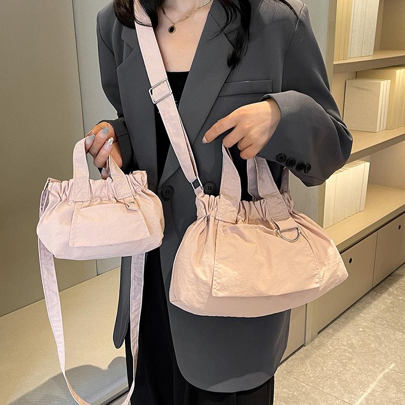 Girls multi-colored light shoulder crossbody dumpling bag 2025 new foldable pleated handbag Small рожевий
Girls multi-colored light shoulder crossbody dumpling bag 2025 new foldable pleated handbag Small рожевий