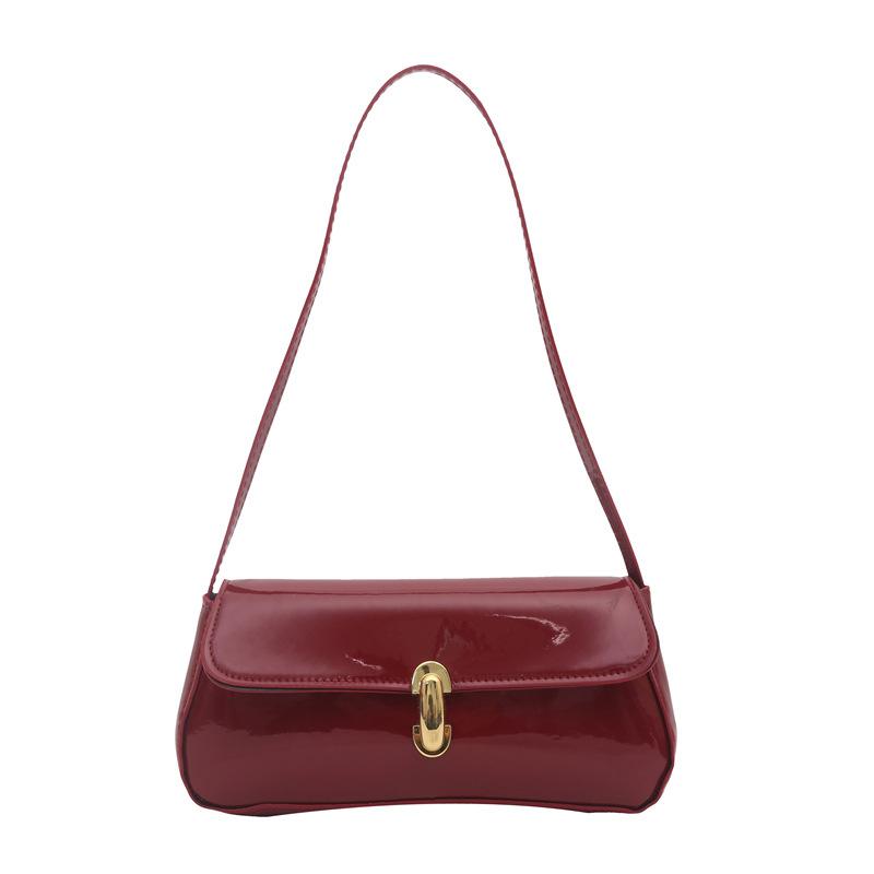 Lacquered single shoulder underarm portable baguette bag personalized trend new lock fashion shoulder bag червоний
Lacquered single shoulder underarm portable baguette bag personalized trend new lock fashion shoulder bag червоний