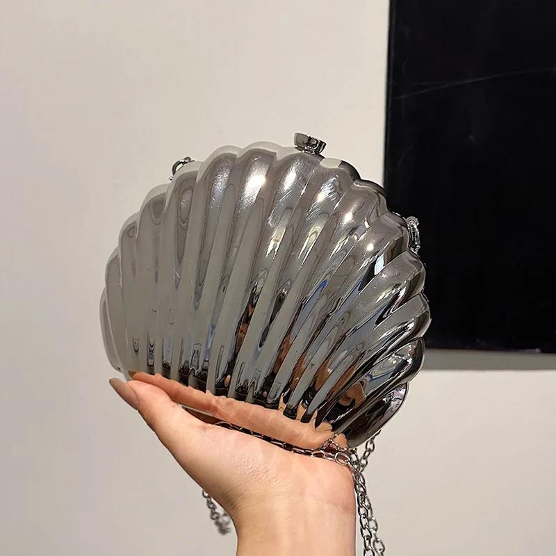 Evening Bags Shell Shape Women Clutch Bags 2024 New Wedding Bridal Handbag Pearl Beaded Fashion Shell Chain Party Bags чёрный
Evening Bags Shell Shape Women Clutch Bags 2024 New Wedding Bridal Handbag Pearl Beaded Fashion Shell Chain Party Bags чёрный