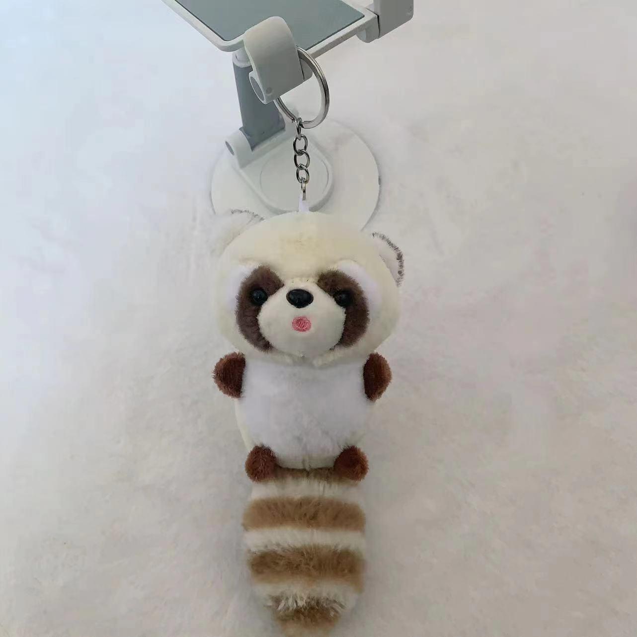 Adorable Long-Tailed Raccoon Plush Keychain Charm
Adorable Long-Tailed Raccoon Plush Keychain Charm