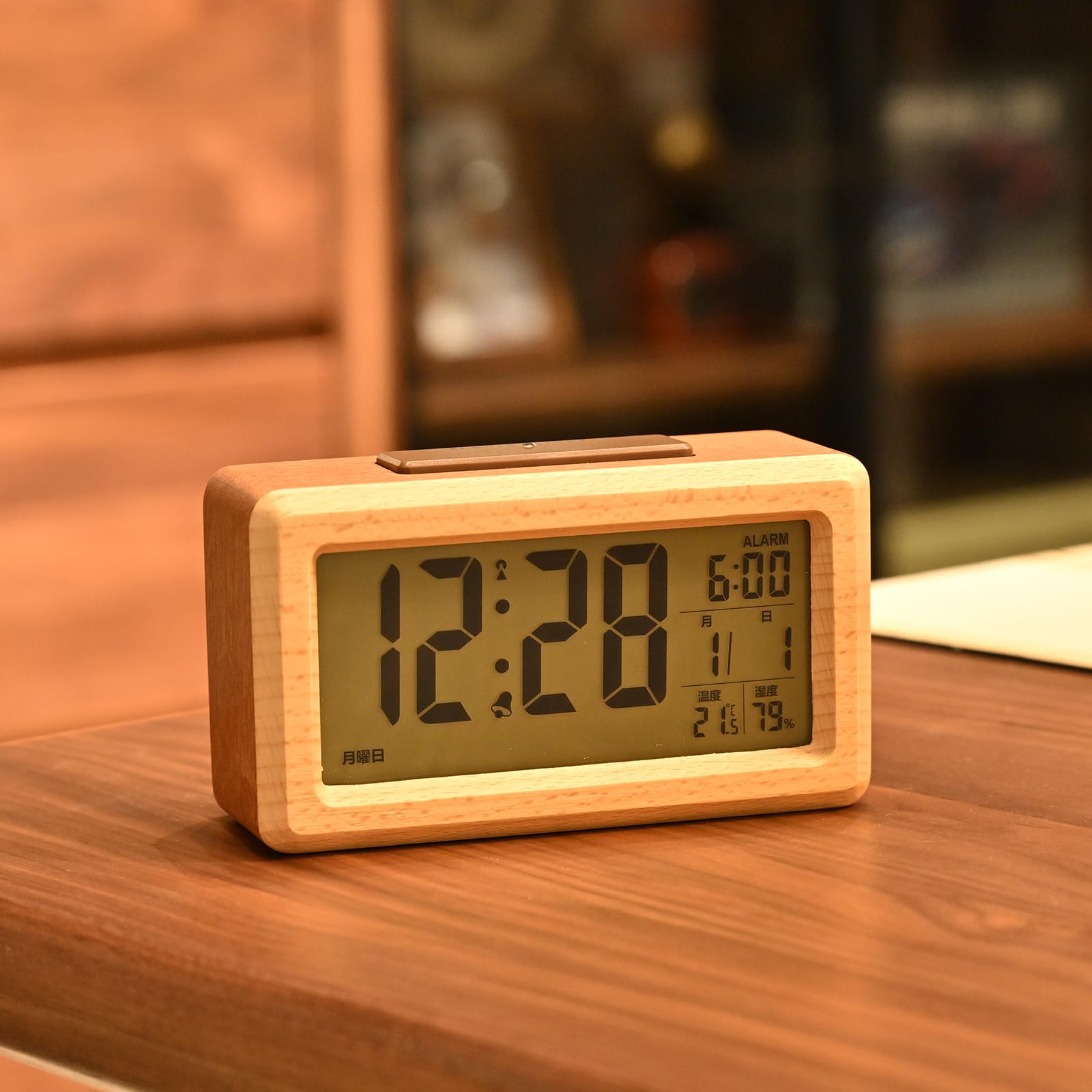 Battery-powered, radio-controlled digital alarm clock made of sapele wood. Stylish digital table clock with snooze function, thermometer and hygromete
Battery-powered, radio-controlled digital alarm clock made of sapele wood. Stylish digital table clock with snooze function, thermometer and hygromete