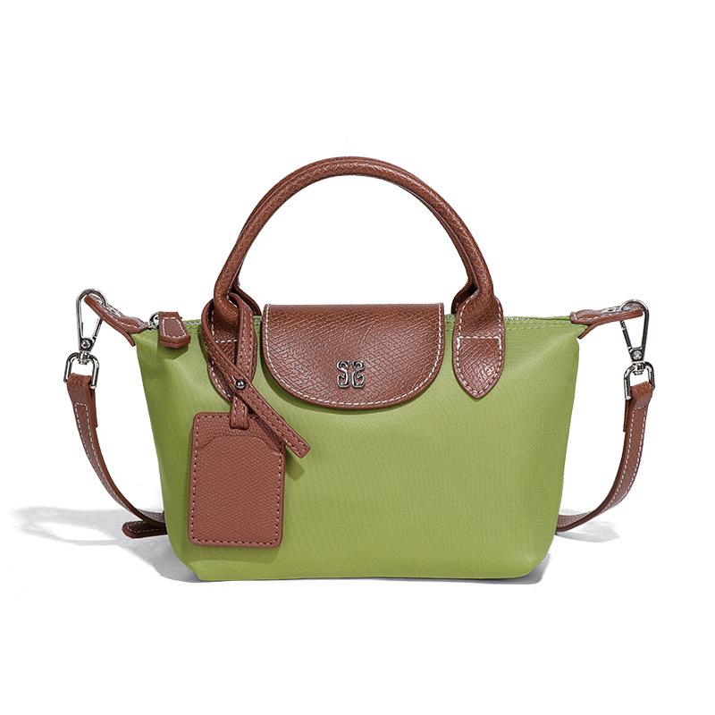 Retro new women s handbag mini nylon waterproof dumpling bag casual versatile shoulder messenger bag fashionable
Retro new women s handbag mini nylon waterproof dumpling bag casual versatile shoulder messenger bag fashionable