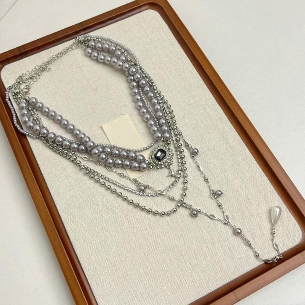 Multilayer Stacked Cross Grey Pearl Long Tassel Necklace Stars Pendant Sweater Chain Women
Multilayer Stacked Cross Grey Pearl Long Tassel Necklace Stars Pendant Sweater Chain Women