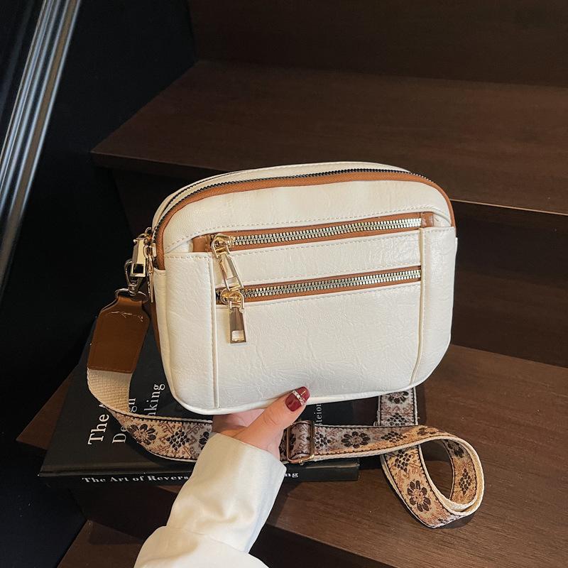 New European and American hot-selling color matching PU bag women s adjustable shoulder strap messenger bag multi-functional zipper shoulder bag
New European and American hot-selling color matching PU bag women s adjustable shoulder strap messenger bag multi-functional zipper shoulder bag